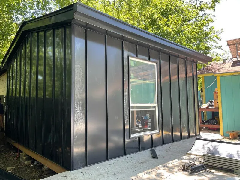 Black standing seam metal wall panels for Metal Roof Installation in DeForest