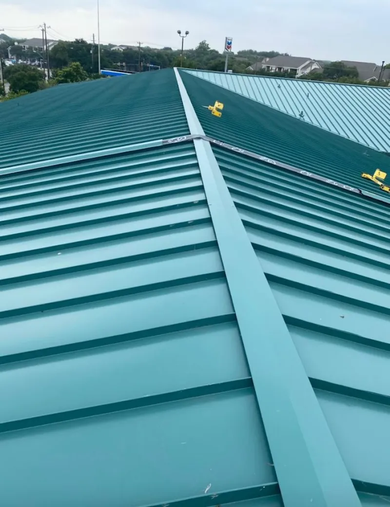 Green commercial metal roof ridge and valley for Metal Roof Repair in DeForest